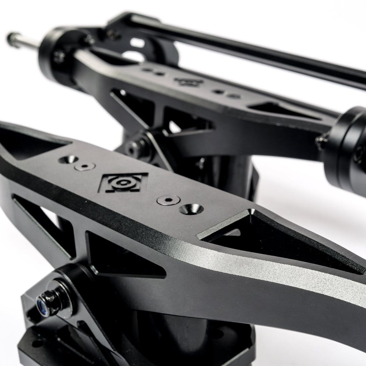 Close-up of a black ONSRA CNC channel truck hanger with logo