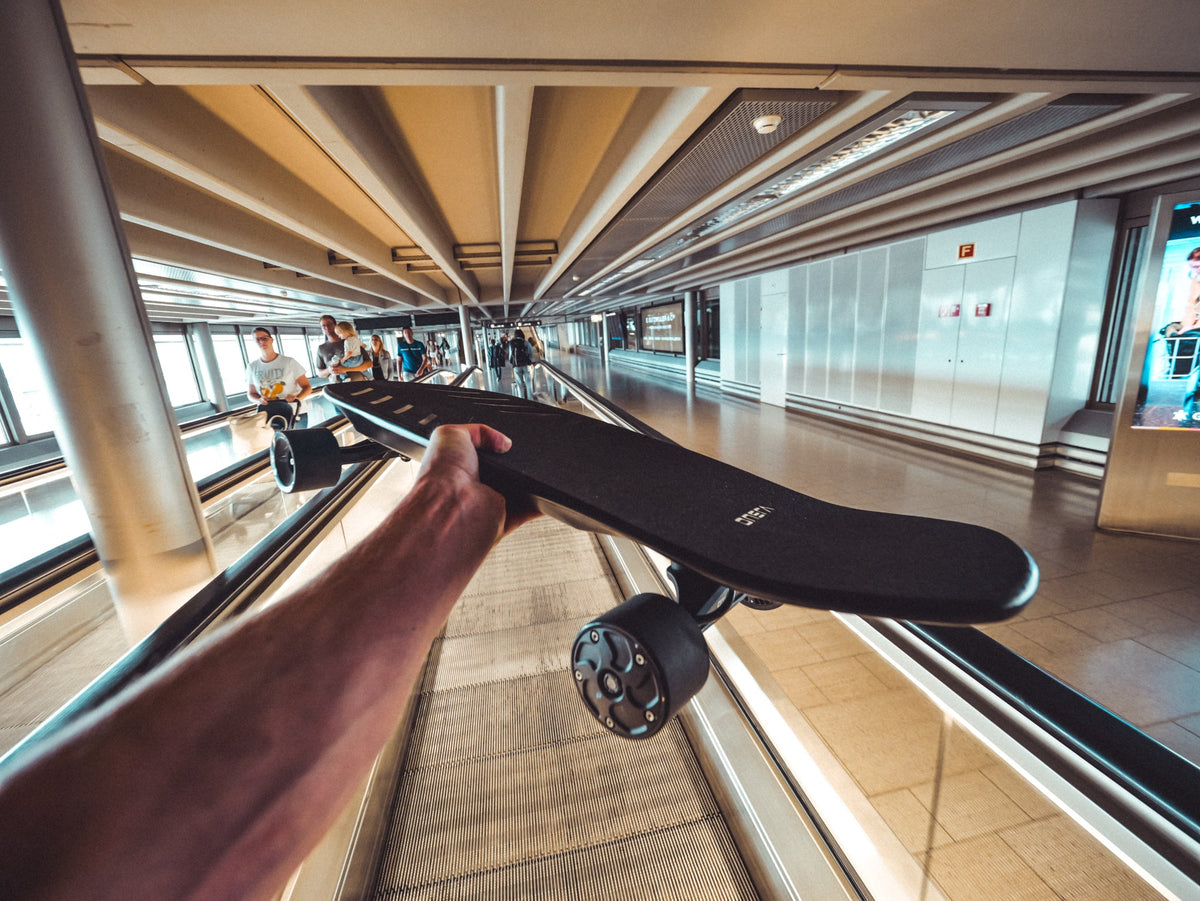 ONSRA electric skateboard riding photo