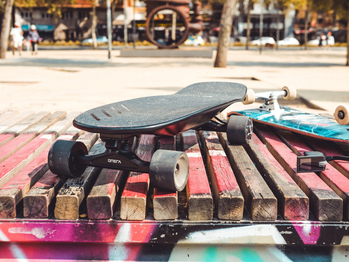 ONSRA electric skateboard riding photo